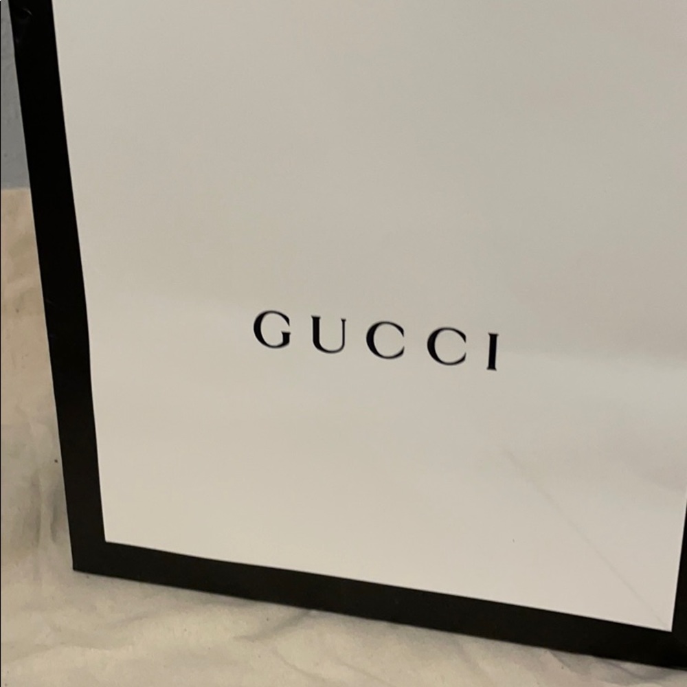 Authentic GUCCI paper bag.